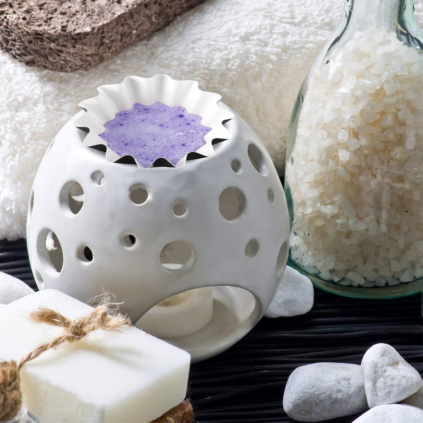 Reusable wax melt liners for mess-free melting of scented candles and wax tarts. Includes 25 cups.